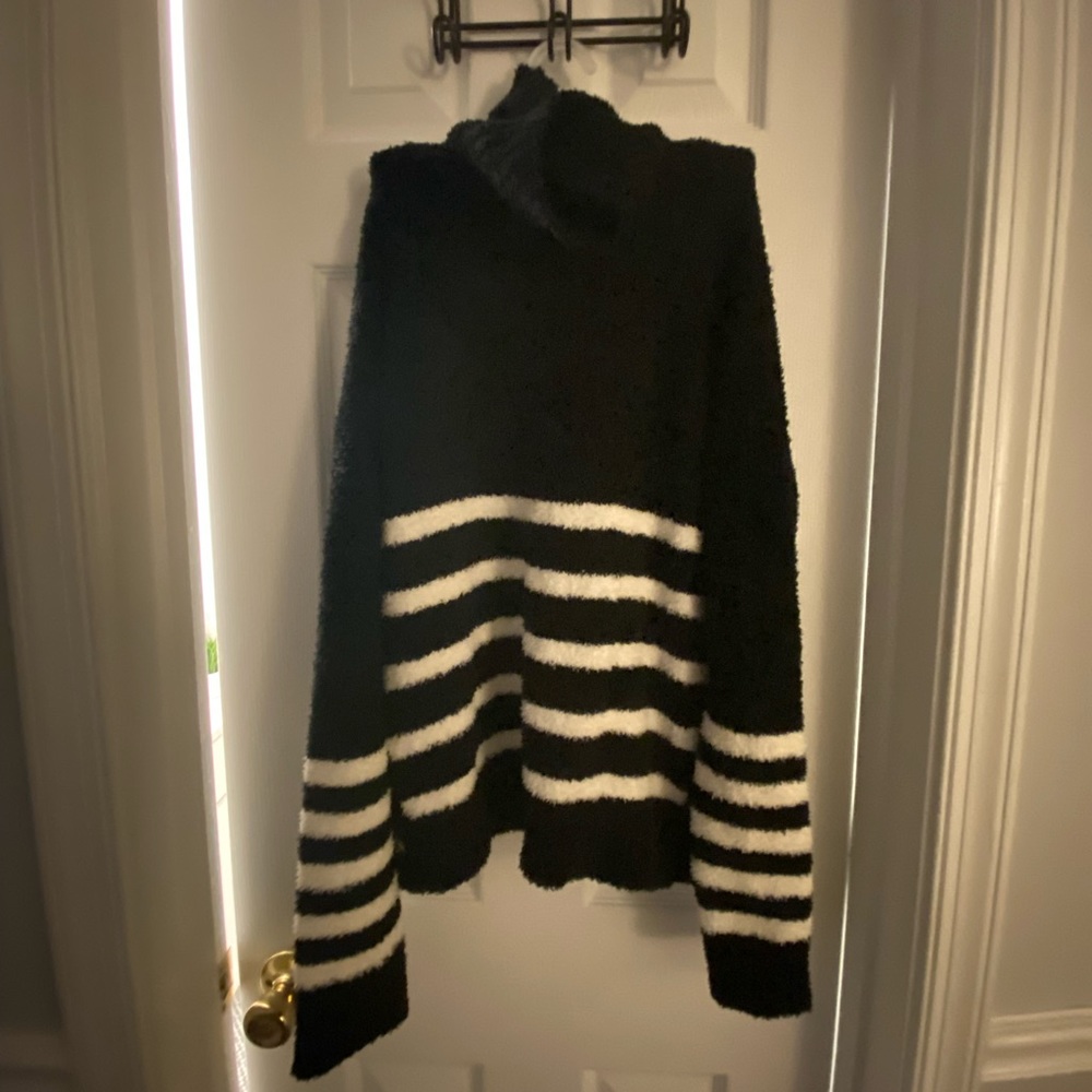 Fuzzy turtleneck sweater from boutique shop